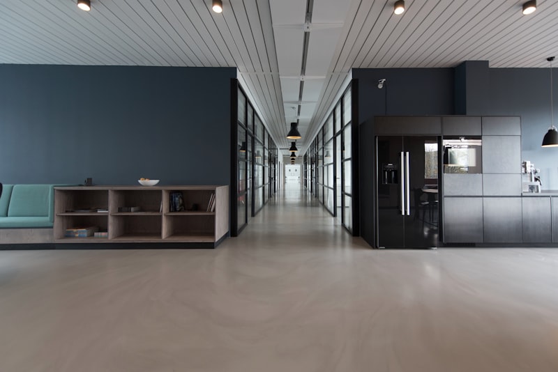 High-end corporate building interior, dark moody lighting, luxury marble floors, emerald reflections, 8k